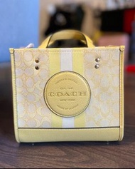 Coach Dempsey Tote 22 In Signature Jacquard With Stripe And Coach Patch in Yellow