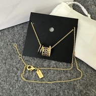 C0a€h Ring Necklace