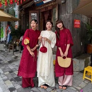 MuzaBoutique stylized bow-tie feather ao dai, modern fringed damask ao dai with silk pants, beautifu