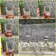 Set of 7 glass cups used to serve drinks