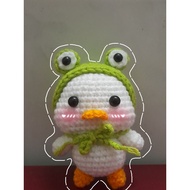 Duck wearing frog scarf