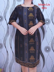 Dress etnik motif rumah adat karo