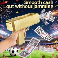 S-Grade Prop Money Gun Toy, อุปกรณ์ประกอบฉากสำหรับงานปาร์ตี้ (โปรดสังเกตขั้ว), ถือในแนวทแยงขึ้นเพื่อ