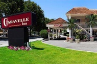 卡拉維爾套房酒店 (Caravelle Inn &amp; Suites)