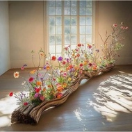 Drift wood with colorful flowers