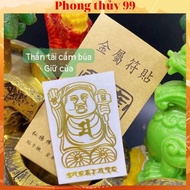 TT phone sticker holding a hammer and holding it