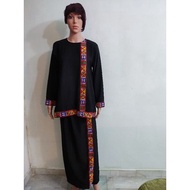Baju kurung dihiasi corak motif Dusun Kujau