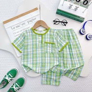 Boy's tole set with short sleeves and long pants made of beautiful, smooth cotton, designed with ded