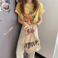 Women's cotton T-shirt with orange print CNY NEONVN - Women's short-sleeved T-shirt with printed thi