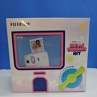 Fujifilm Mini 12 Mello Buddies kit with Mini Film 10sx1 Hand Strap and Mello Buddies