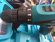 Máy khoan pin búa 12 vôn Makita DF330DWE -Xuất xứ Thái lan (đủ 3 chức năng bắn vítkhoan sắt gỗ đặc b