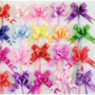 File of 10 bows in sizes 1.2cm, 1.8cm, 3cm to decorate gift baskets CNY, gift electronics