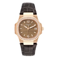 Patek Philippe Patek Philippe Nautilus (Reference 7010R-012). A rose gold diamond set quartz wristwa