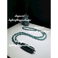 Necklace with blue beads mixed with dzi code