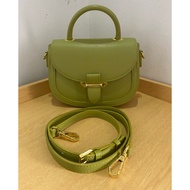Preloved Nucelle Sling bag Apple green color