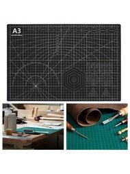 1包黑色a3藝術墊,由pvc防滑皮革製成,帶有網格線切割墊,適用於業餘愛好者的自製藝術設計！