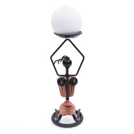 Bộ 1 nến thơm banh tròn Miss Candle Ftramart (Trắng) và 1 chân nến sắt mỹ thuật hình cô gái gùi (Đen