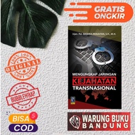 BOOK ON REVEALING TRANSNATIONAL CRIMES - IRJEN POL. (PURN) BASARIA PANJAITAN, SH, MH