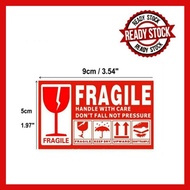 Fragile Sticker stiker mudah pecah 9cmx5cm For Pos laju DHL J&T Dan Sebagainya