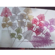 Glitter branches decorate fortunes, cake towers, fruit towers