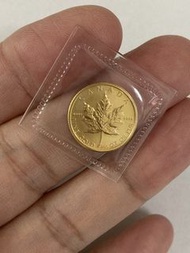 1988年1/10安士楓葉金幣！成色999.9純黃金！重量8.3分（即3.11克）！一面英女皇伊利沙伯二世年青肖像！另一面加拿大象徵的楓葉！全新未開封！