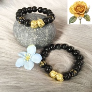 Black beaded bracelet with feng shui pixiu