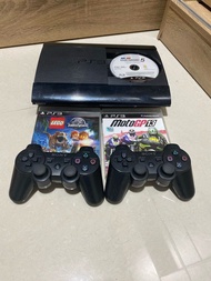 PS3 super slim 2 controllers and 3 games