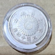 大日本大正十四年旭日鳳凰五十錢銀幣，詳如上图。