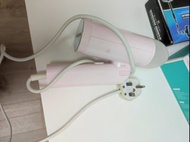 粉色手持式蒸氣熨斗