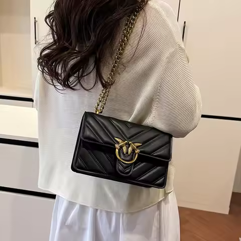 Architectural Unibody Shoulder Bag with Seamless Construction for Urban Commuting Exuding Minimalist