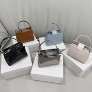 CNK 24 00701397 quilted chain crossbody mini phone bag for women