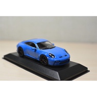 Mini Cut Minichamps 1: 43 Porsche Porsche 911 (992) GT3 Touring Blue/Black Wheel, Limited to 300 Set