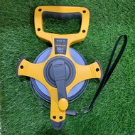 Komelon เทปวัดระยะเหล็กเคลือบไนล่อน 50ม. Fast back (Nylon Coated steel tape) รุ่น KMB50K