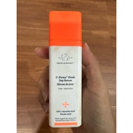 Empty bottle of drunk elephant facial serum vitamin c /c-firma drunk e serumDAY