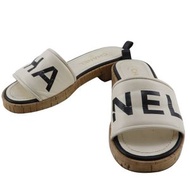 二手 CHANEL 香奈兒 Logo 穆勒鞋 G34876，皮革和軟木，義大利製造，白色/黑色，女士