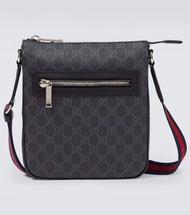 Gucci GG canvas leather-trimmed crossbody bag
