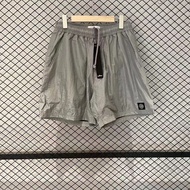 Stone Island ฤดูร้อนหินโลหะไนลอนกางเกงขาสั้นปักสบาย ๆ หลวมกางเกงห้าส่วนแห้งเร็วผู้ชายและผู้หญิงออกกำ