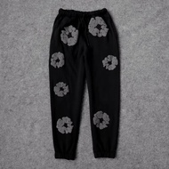 TEARS DENIM TROUSERS