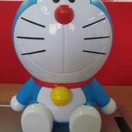 Botol minum doraemon xxi, tinggi kurang lebih 18cm, tidak ada sedotan