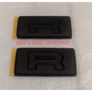 Matte black R type writing emblem