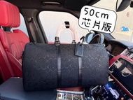 COACH蔻馳 黑色老花壓印旅行袋