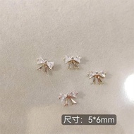 Set of 2 nail charms with bow nails A11