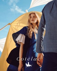 專櫃Cotelac法國設計師品牌象牙白都會女性優雅雙口袋開衩裙