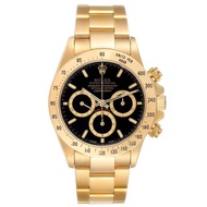 Rolex Rolex Daytona (Reference 16528). A yellow gold automatic wristwatch with chronograph.