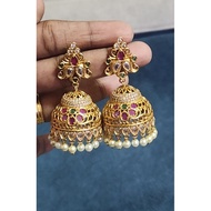 Big jumka ad stone earrings
