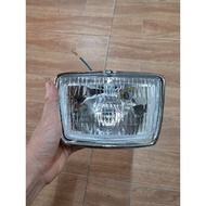 Cub 82 headlights come with bulbs