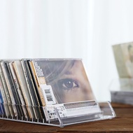 กล่องใส่ซีดีตั้งโต๊ะแบบหลายช่องคริสตัลใสอะคริลิคดีไซน์เรียบง่ายแฟชั่นกล่องเก็บแผ่นดิสก์ชั้นวาง CD