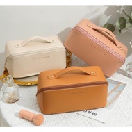 PU leather cosmetic bag with spacious box form and diagonal zipper