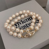 英國知名設計師品牌Vivienne Westwood經典土星雙層珍珠磁釦手鍊 代購服務