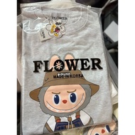 💜 Cute เสื้อยืดoversize(FLOWER)ลาบุบู้ชาวสวน Women Labubu T-shirt